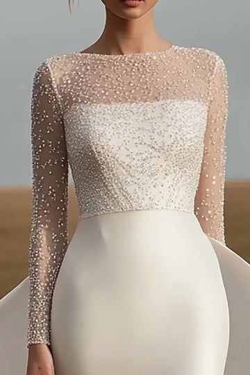 Robe de mariée fourreau à manches longues en satin ivoire avec perles